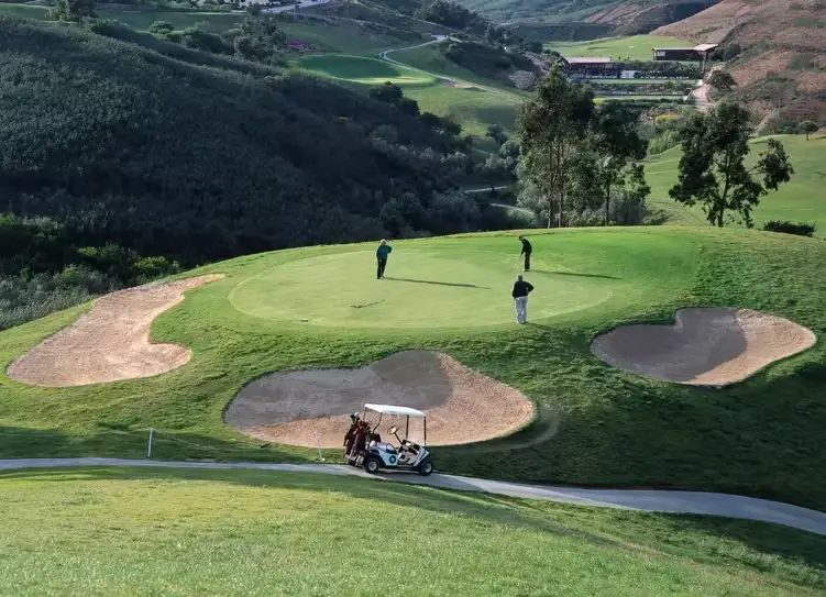 Lush green fairways and holiday accommodation villas at Santo António Golf Resort, formerly known as Parque da Floresta