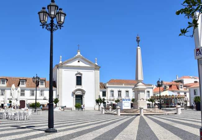 The classic pombaline architecture and open pedestrian square of neighboring town Vila Real de Santo António near Monte Gordo